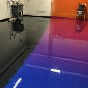 Epoxy and polyaspartic garage floor coatings showcasing durability and aesthetic appeal